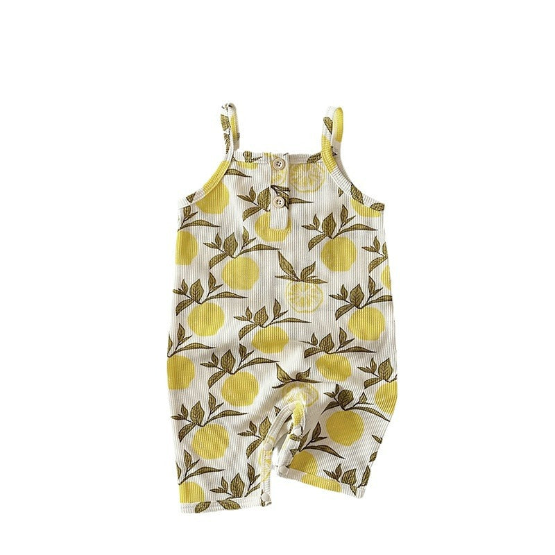 Baby romper with lemon pattern on a white background