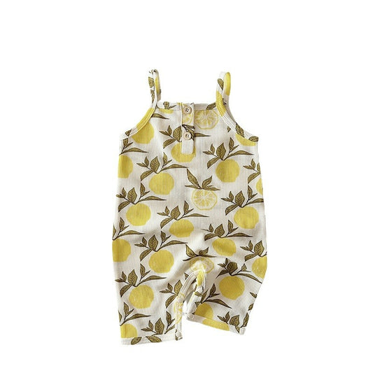 Baby romper with lemon pattern on a white background